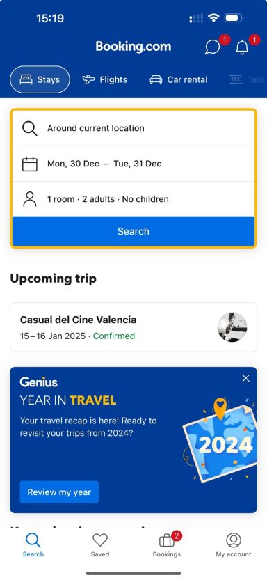 Booking.com mobile interface displaying search options and upcoming trip details.